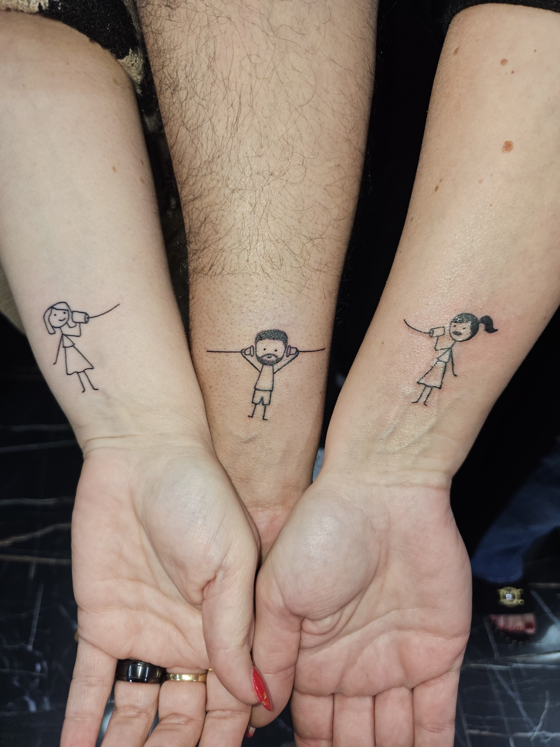 Fine line floral tattoo