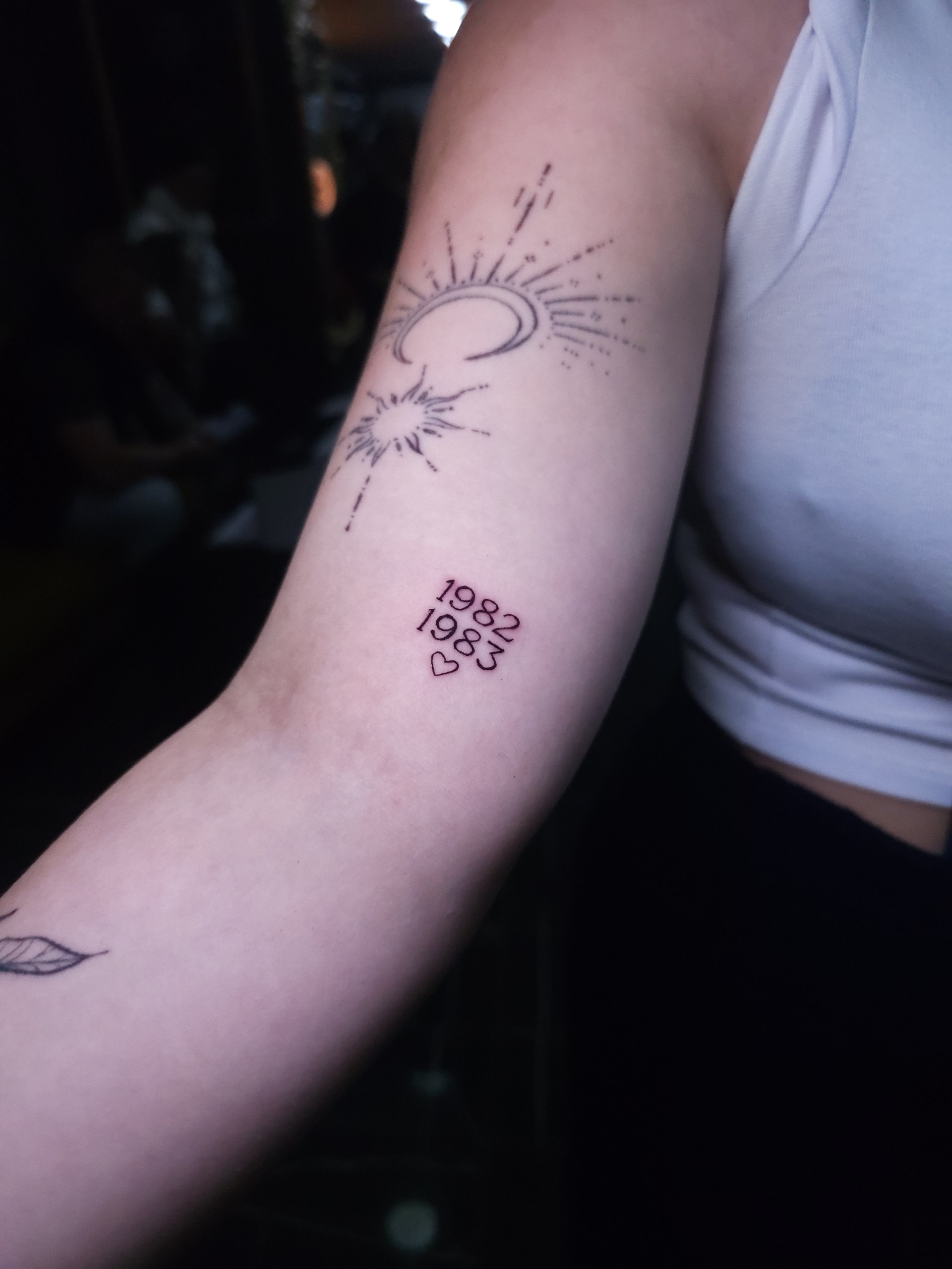 Black and grey leg tattoo