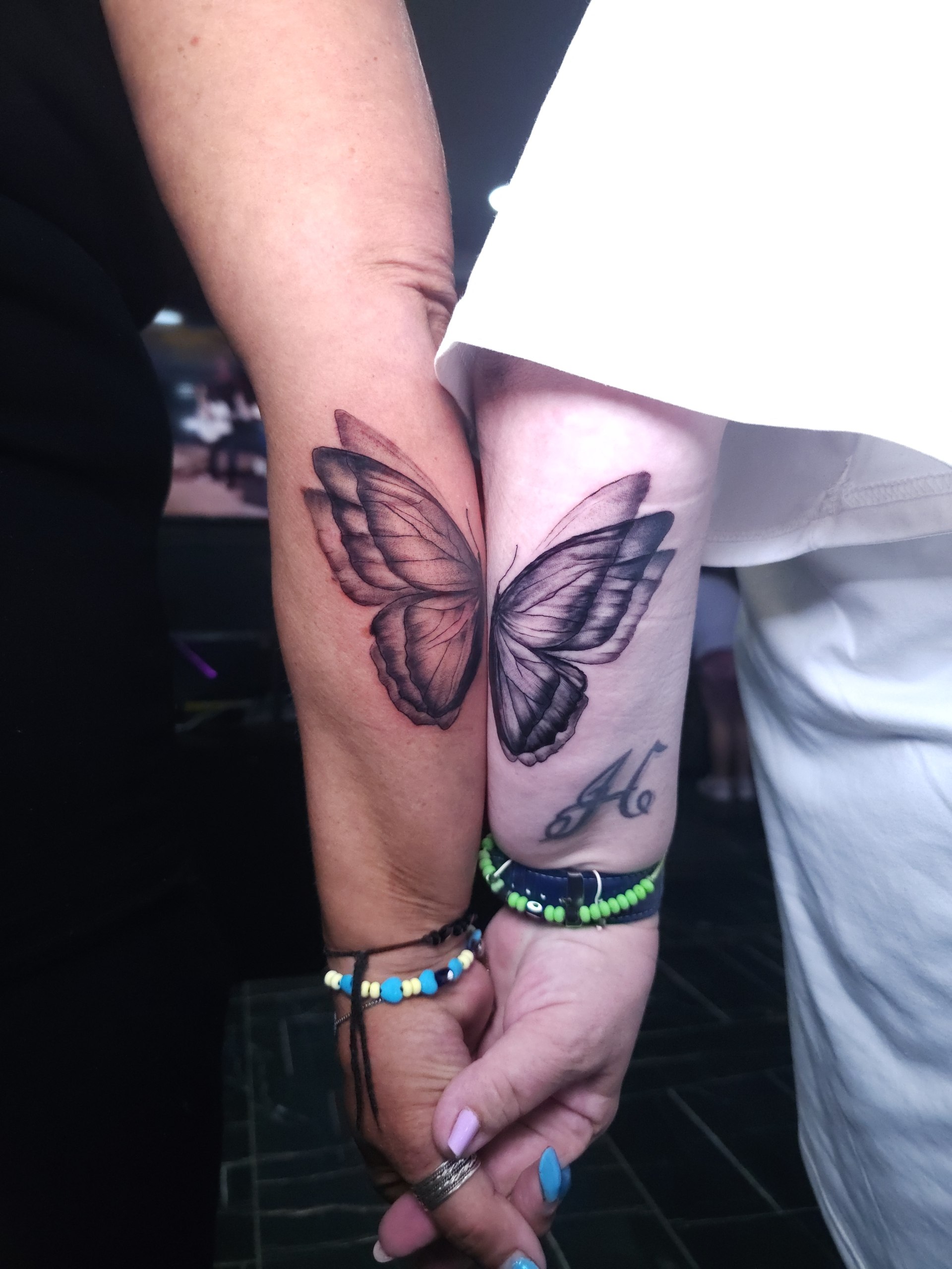 Black and grey rose tattoo